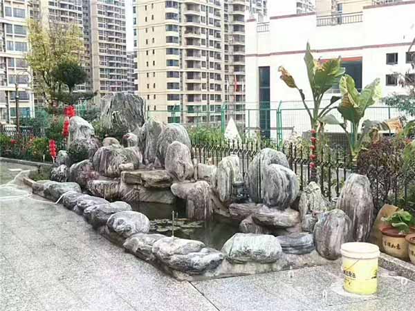 金色家園泰山石魚池假山.jpg